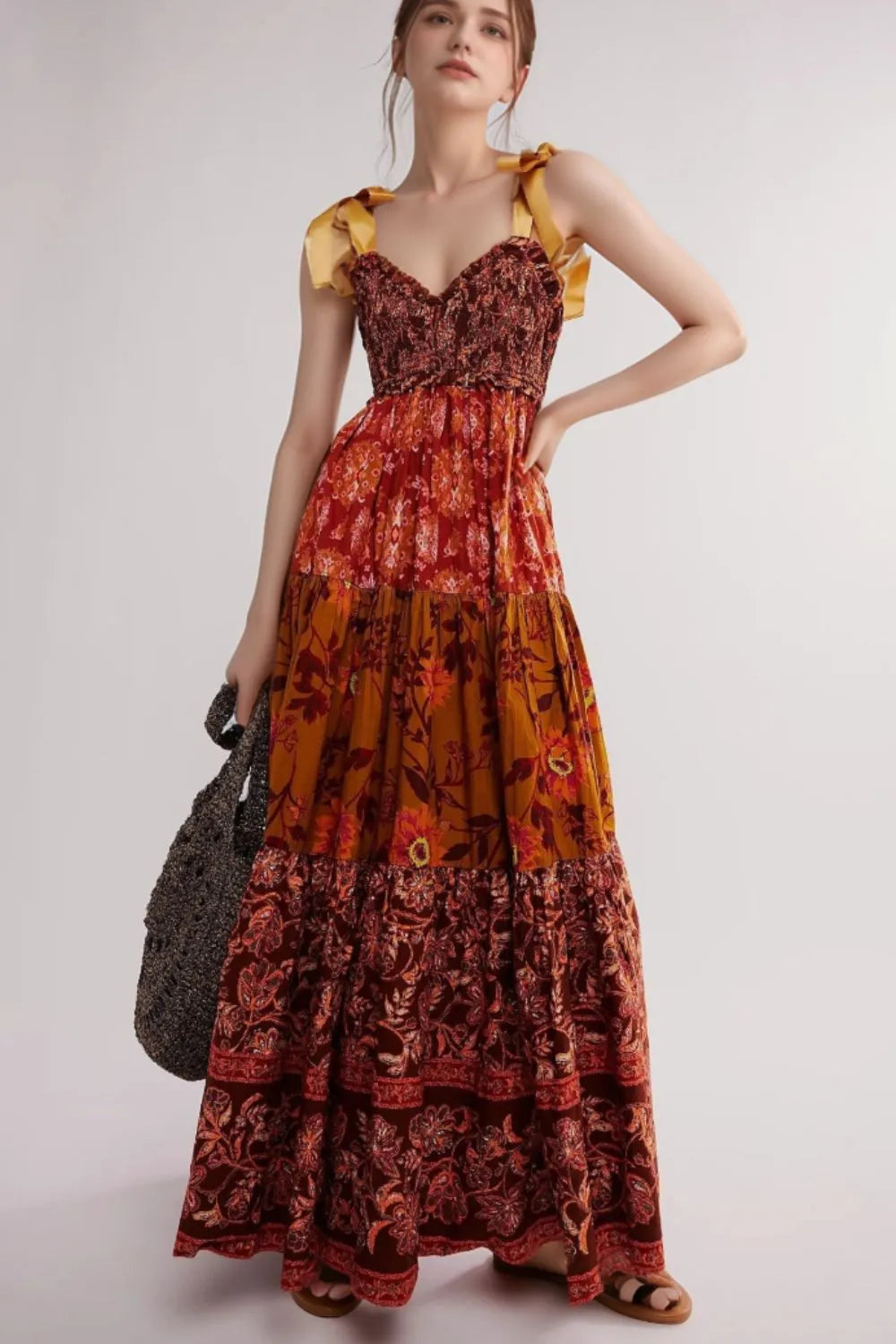 Floral Tiered Maxi Dress with Mixed Print Design.