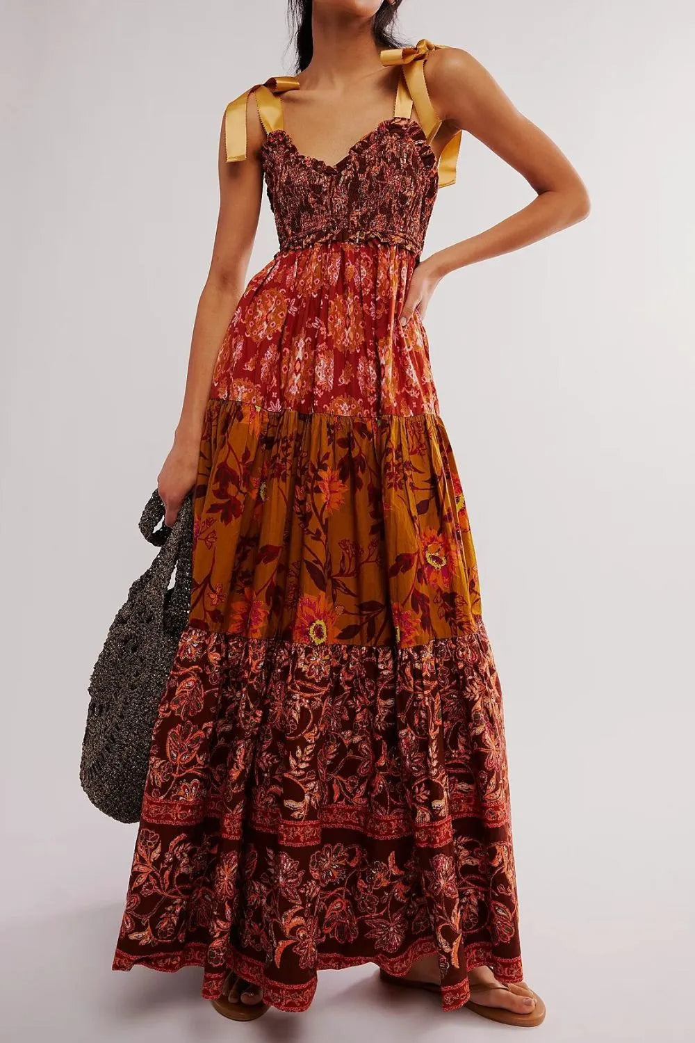 Floral Tiered Maxi Dress with Mixed Print Design.