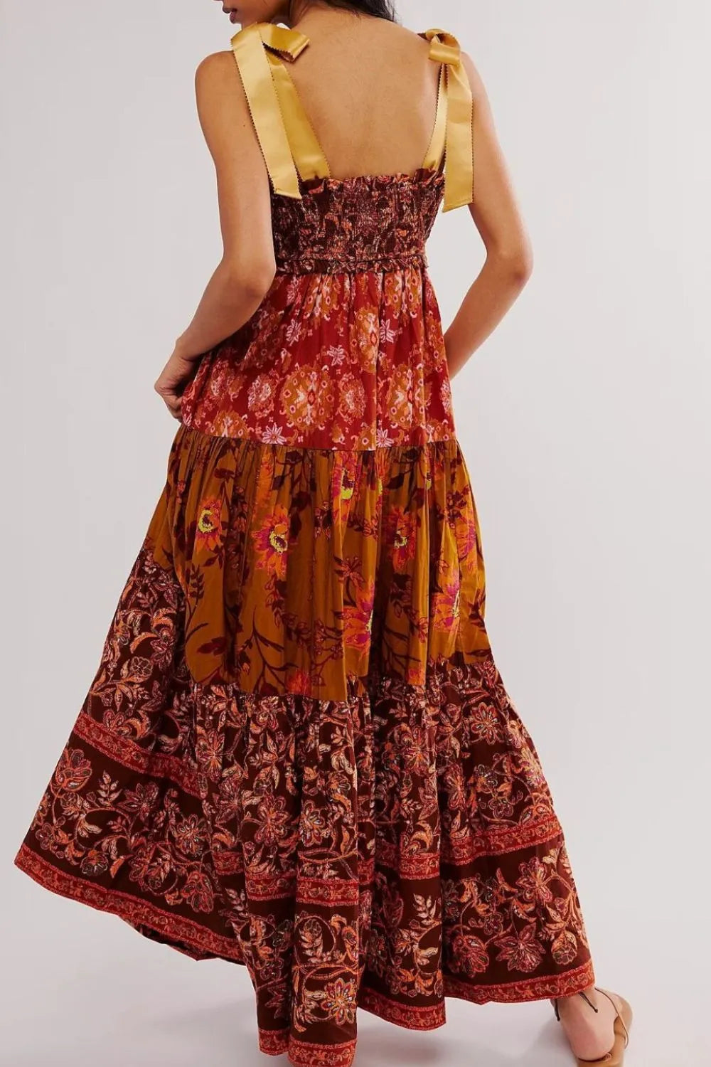 Floral Tiered Maxi Dress with Mixed Print Design.