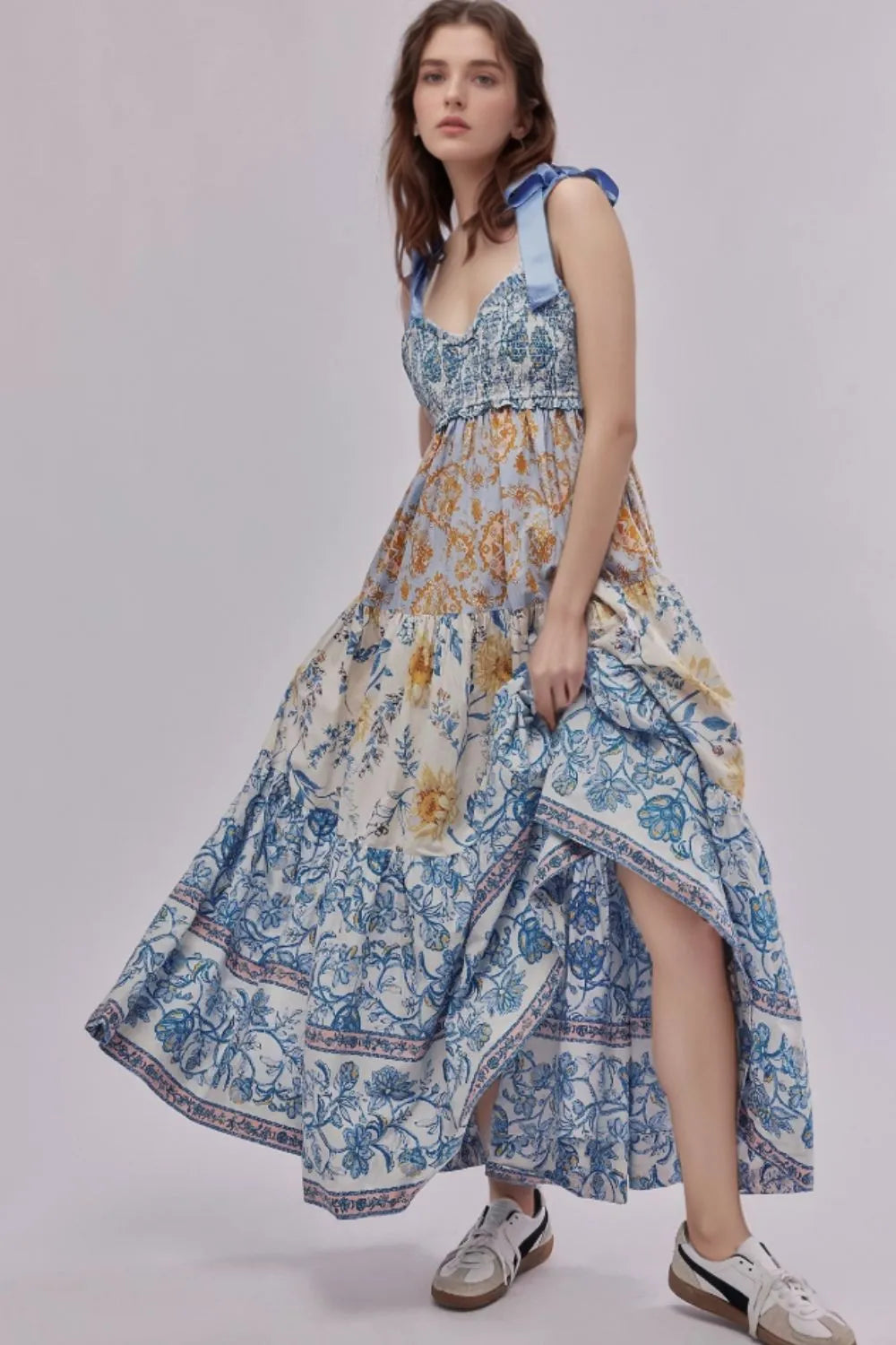 Floral Tiered Maxi Dress with Mixed Print Design.