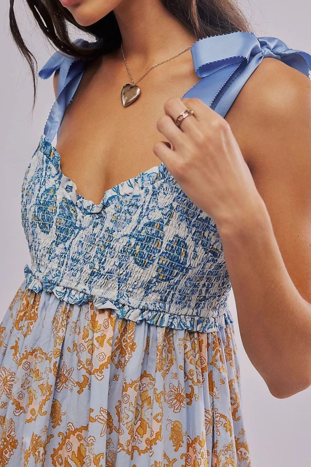 Floral Tiered Maxi Dress with Mixed Print Design.