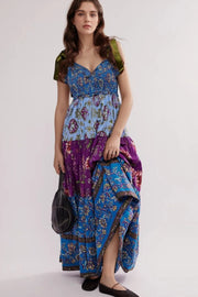 Floral Tiered Maxi Dress with Mixed Print Design.