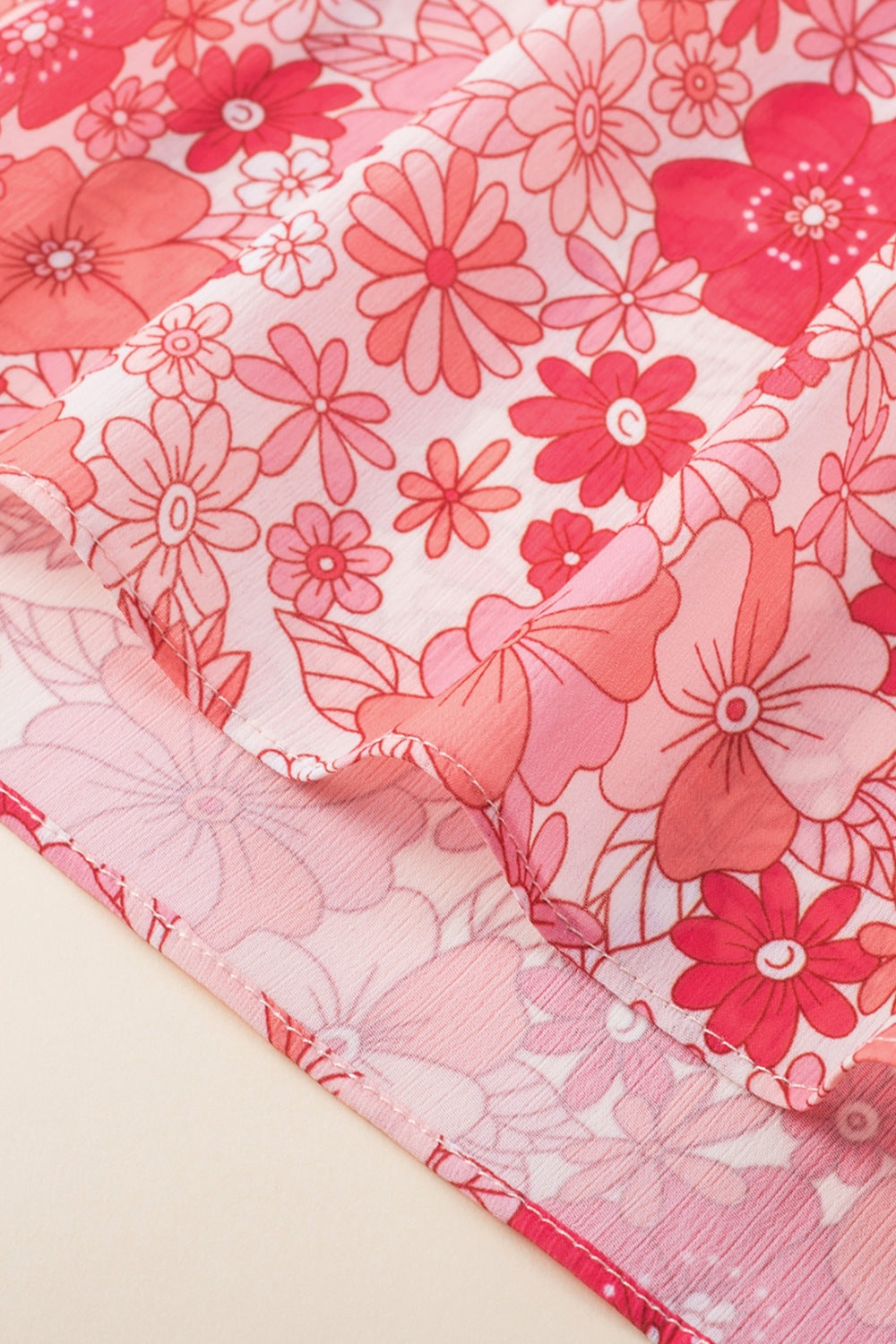 Floral V-neck three-quarter sleeve blouse.