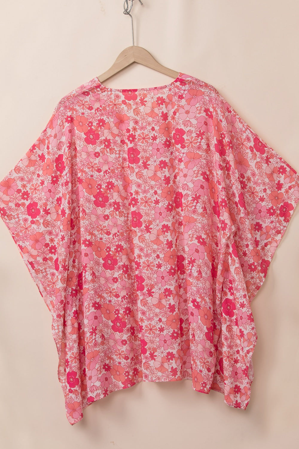 Floral V-neck three-quarter sleeve blouse.