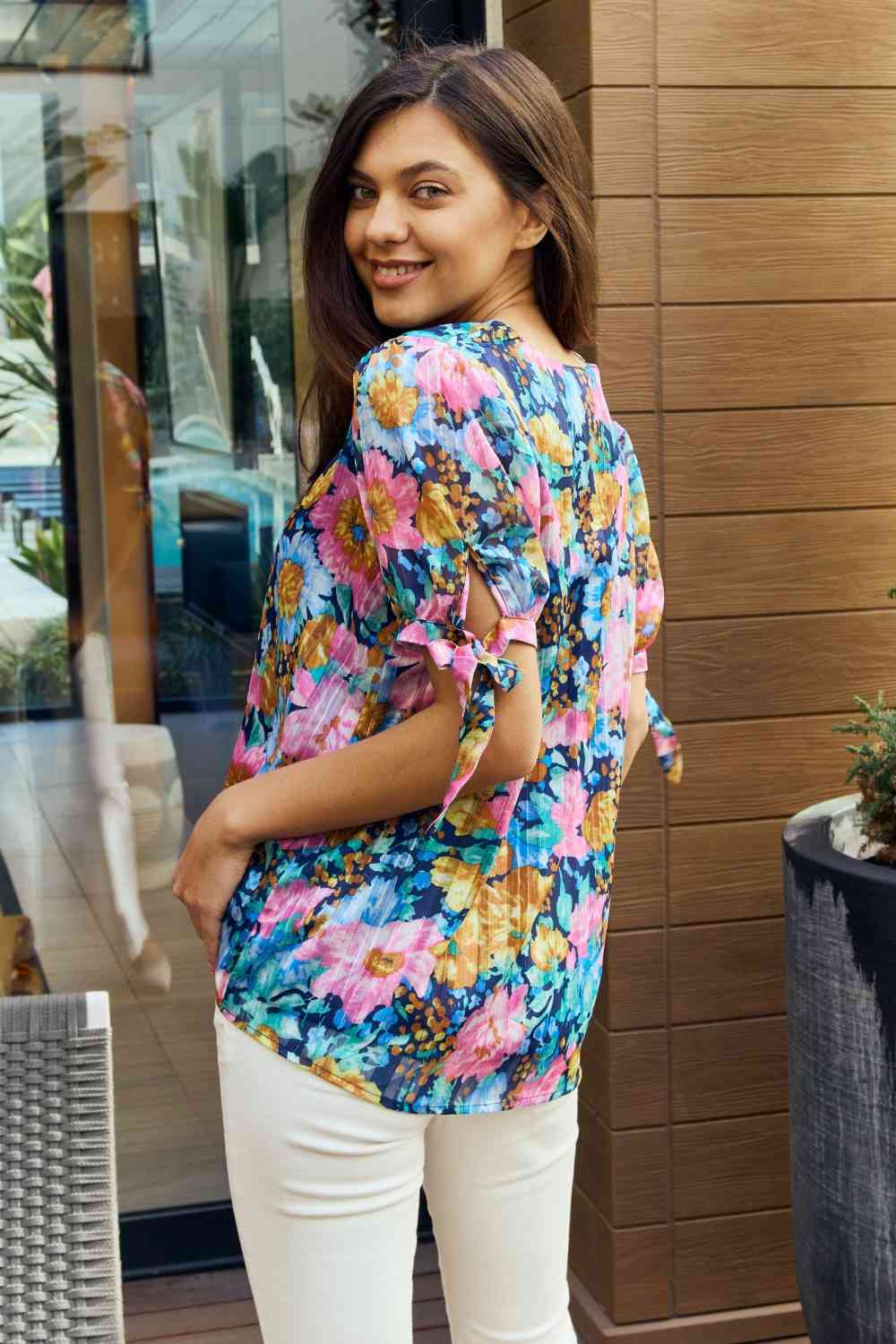 Petal Dew full size floral V-neck tie detail blouse.