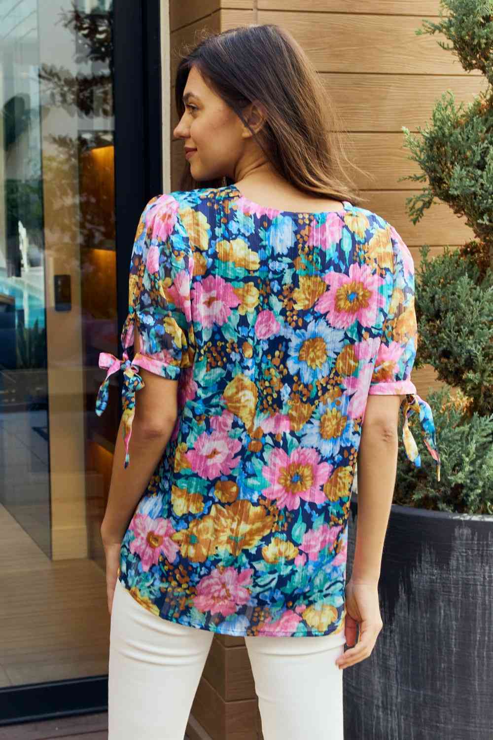 Petal Dew full size floral V-neck tie detail blouse.