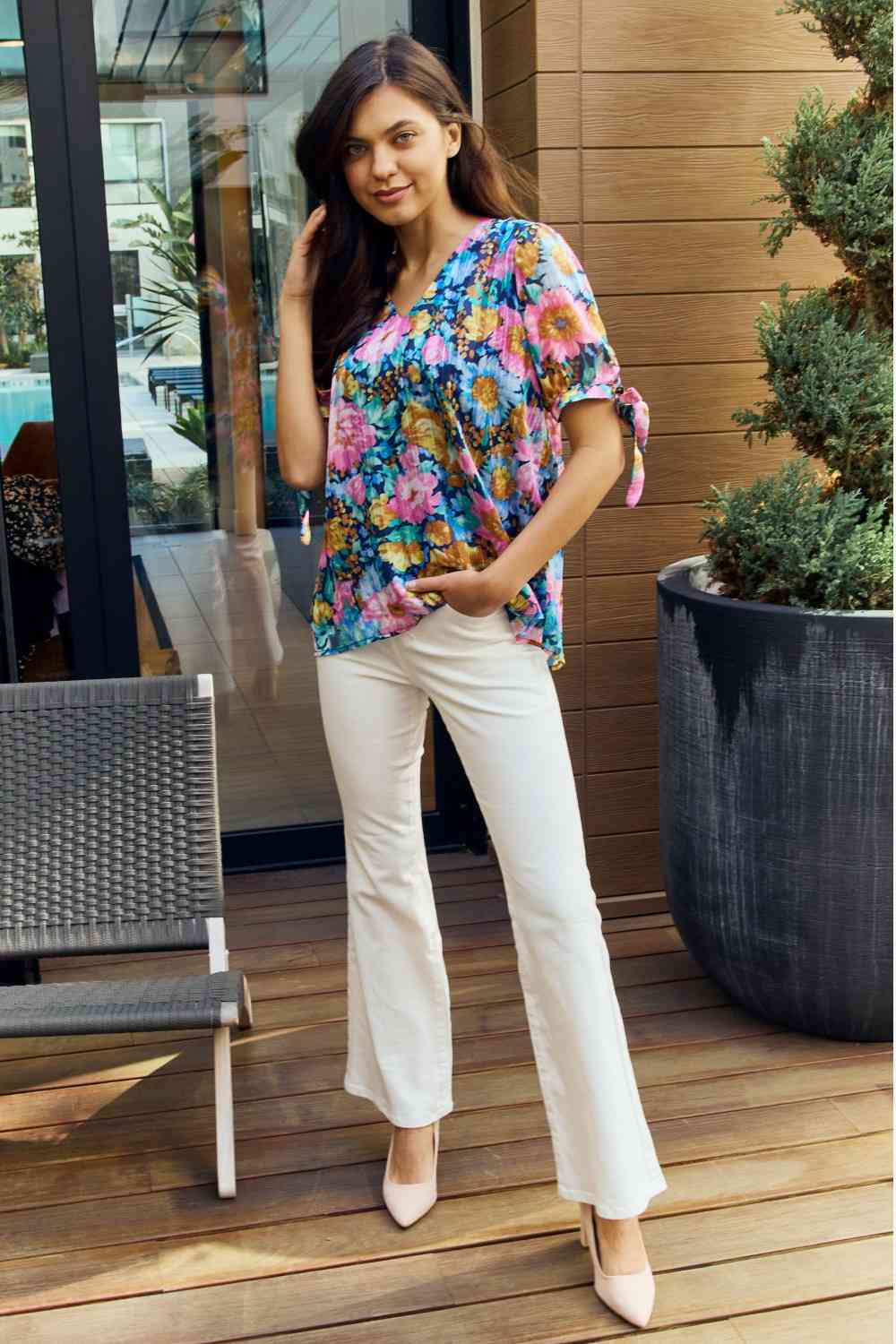 Petal Dew full size floral V-neck tie detail blouse.