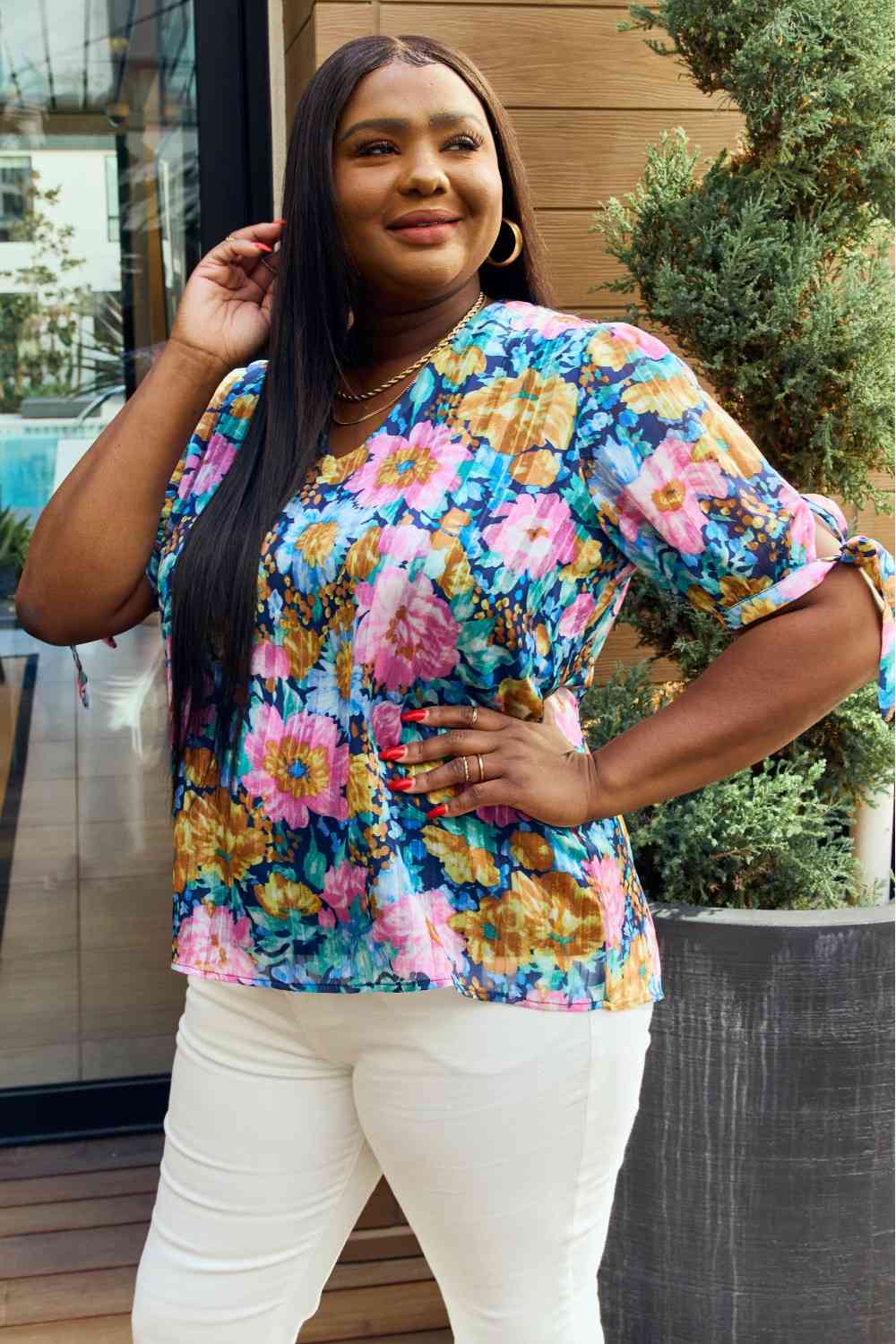Petal Dew full size floral V-neck tie detail blouse.