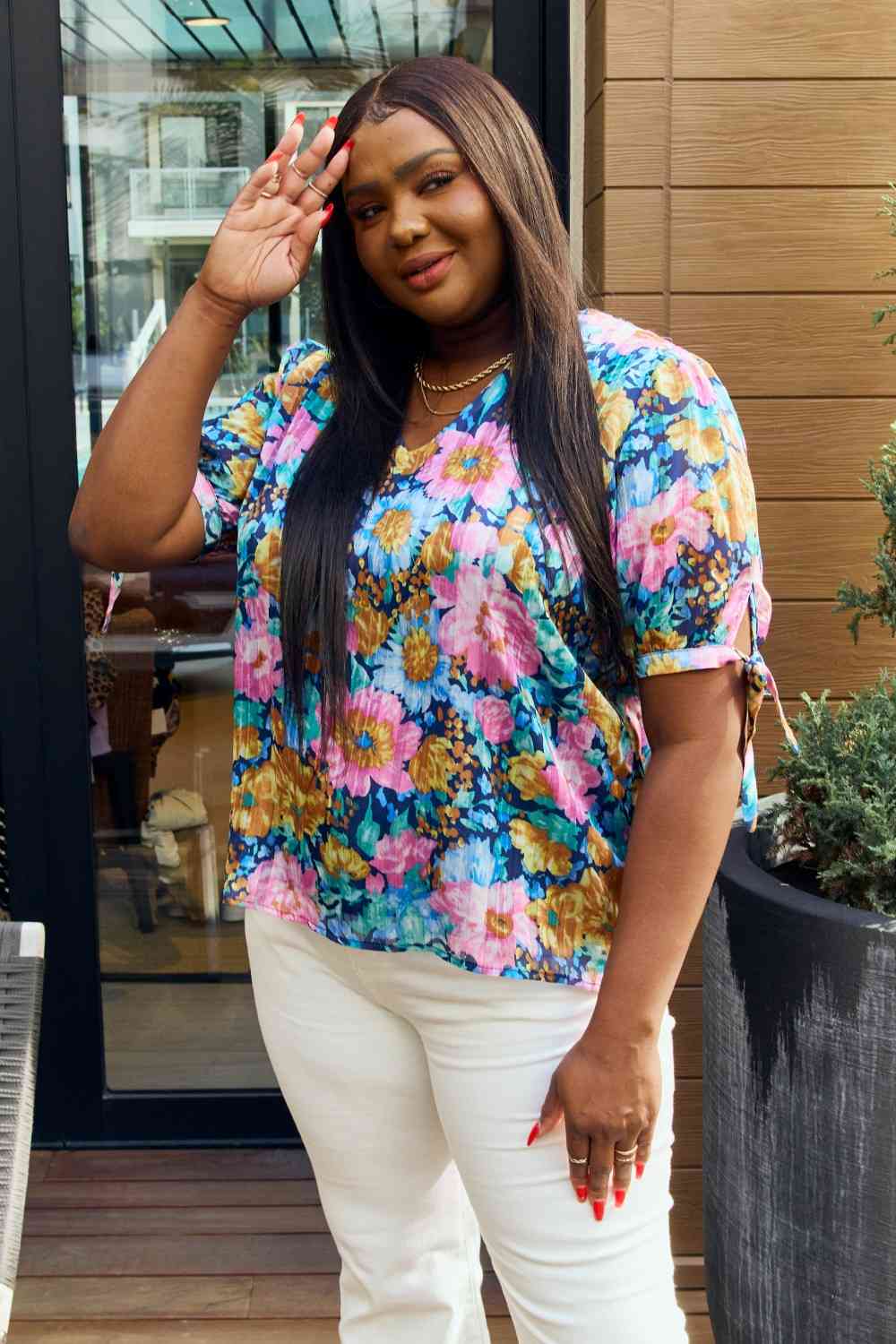 Petal Dew full size floral V-neck tie detail blouse.