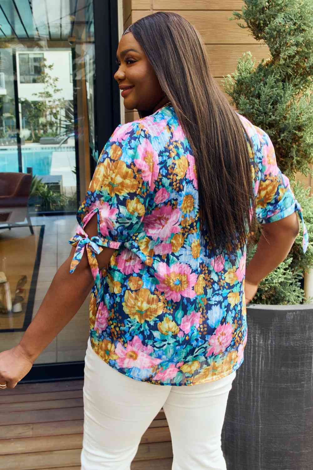 Petal Dew full size floral V-neck tie detail blouse.