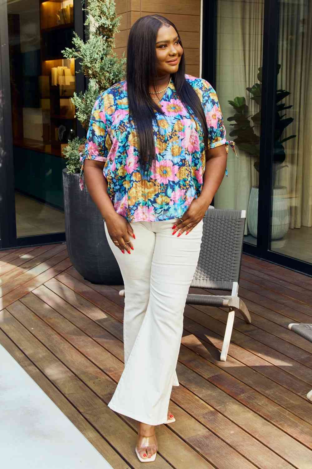 Petal Dew full size floral V-neck tie detail blouse.