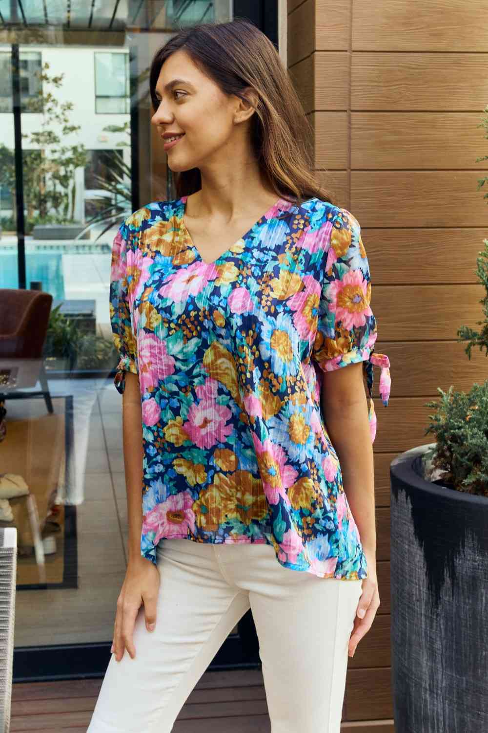 Petal Dew full size floral V-neck tie detail blouse.