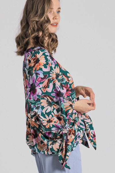 Umgee full size floral V-neck tie sleeve blouse, plus size.
