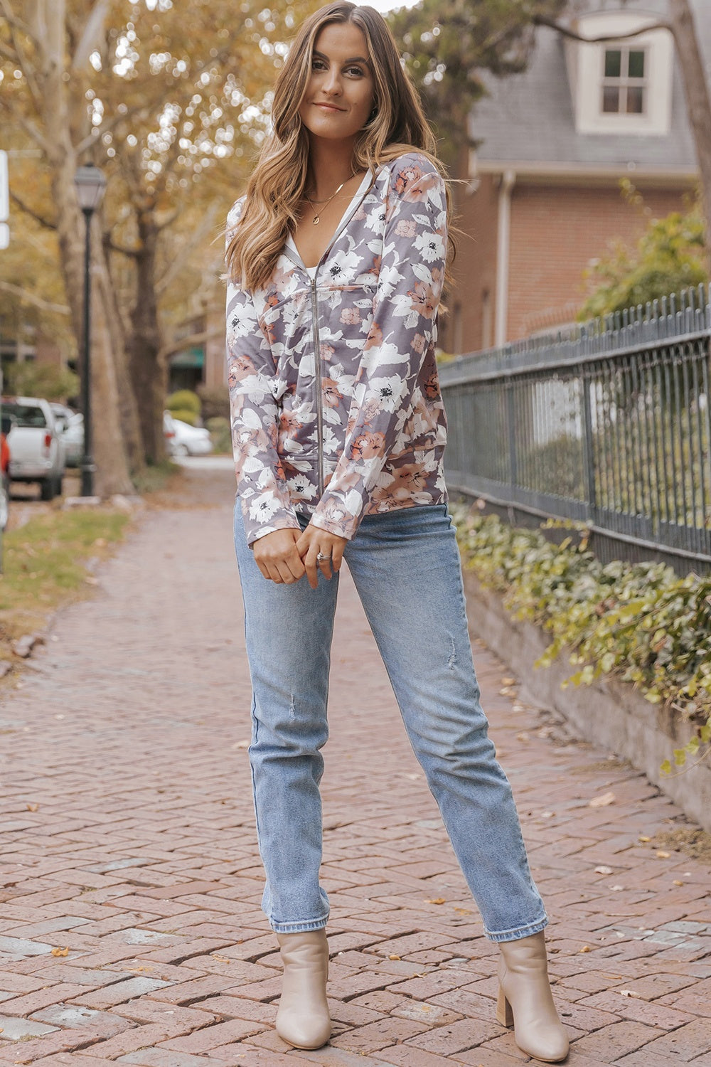 Floral zip up pocketed hoodie.