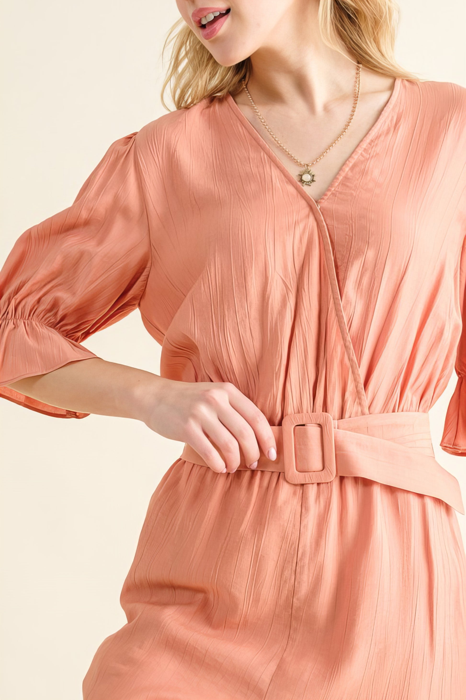 Flounce Sleeves Romper with Belt and Ruffled Details.