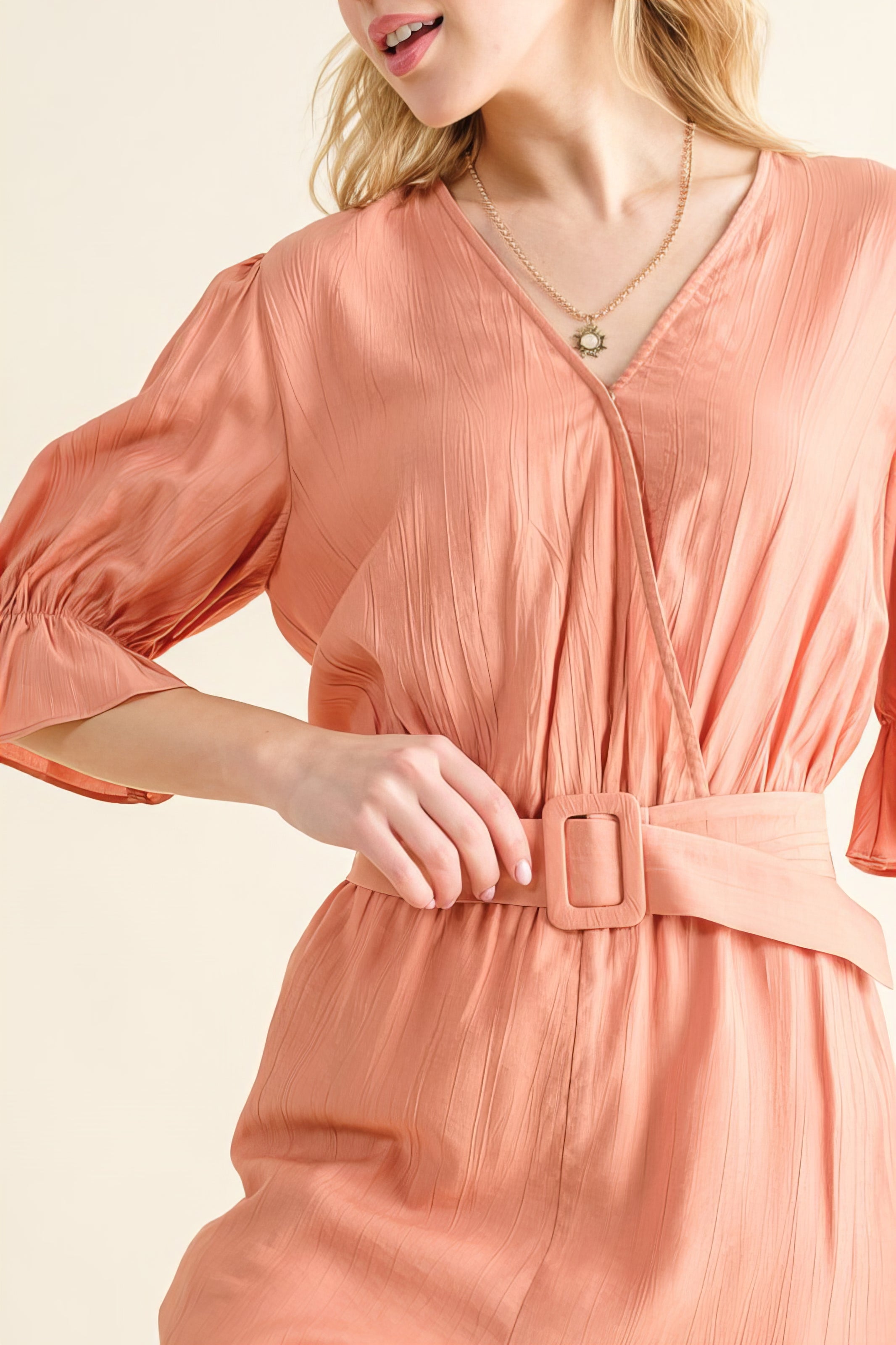 Flounce Sleeves Romper with Belt and Ruffled Details.