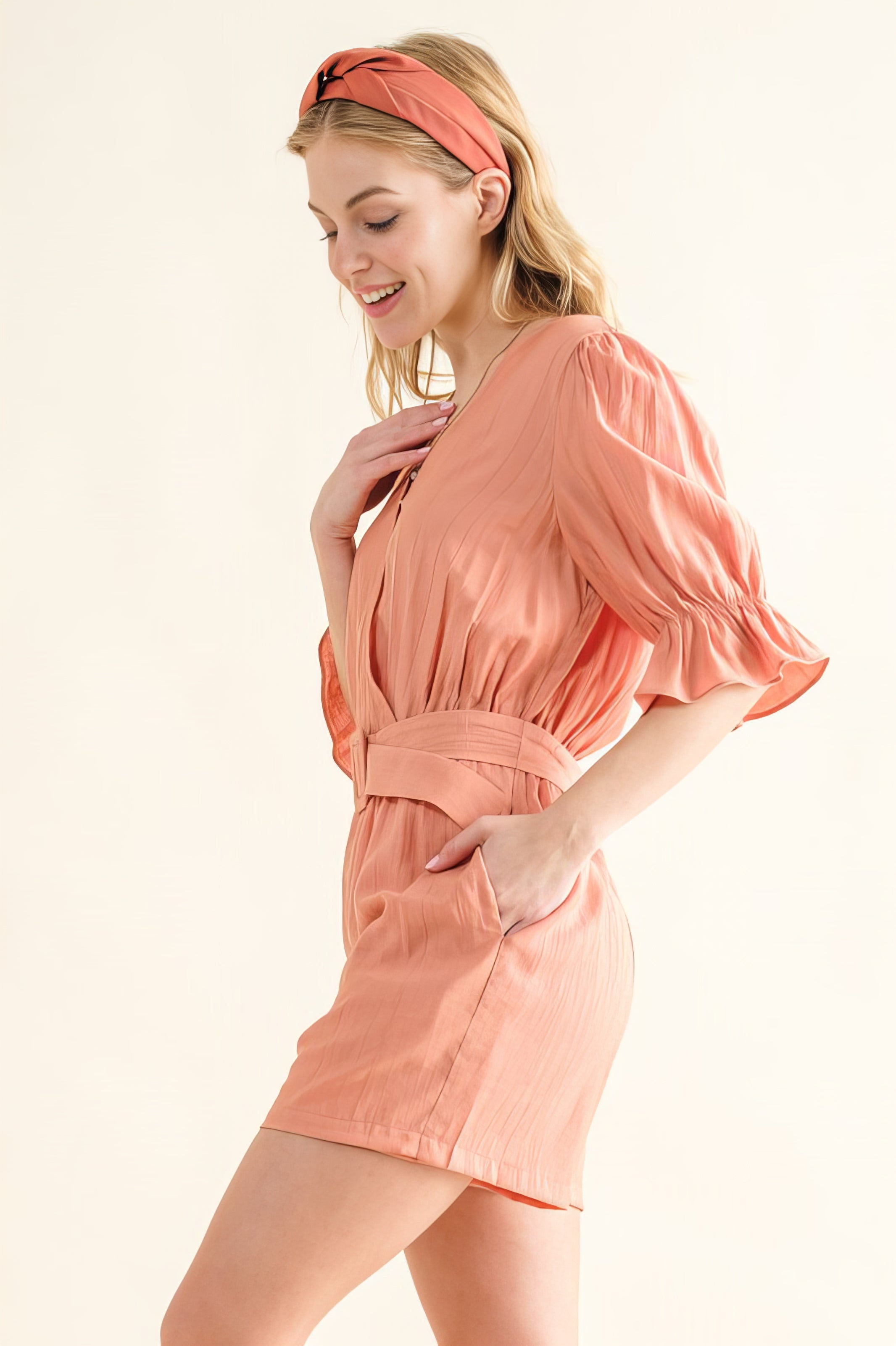 Flounce Sleeves Romper with Belt and Ruffled Details.