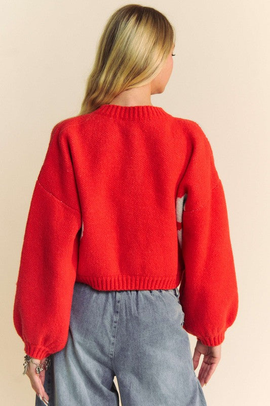 Flower contrast round neck long sleeve cardigan with ribbed and buttoned details.