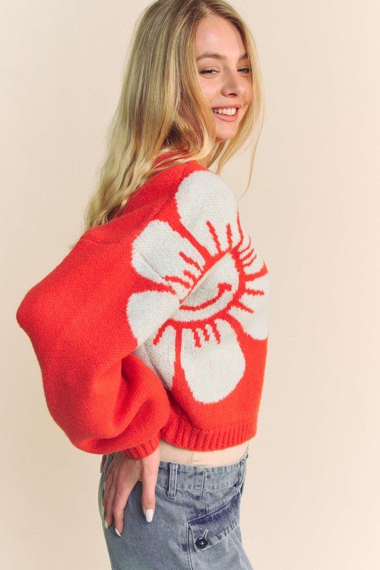 Flower contrast round neck long sleeve cardigan with ribbed and buttoned details.