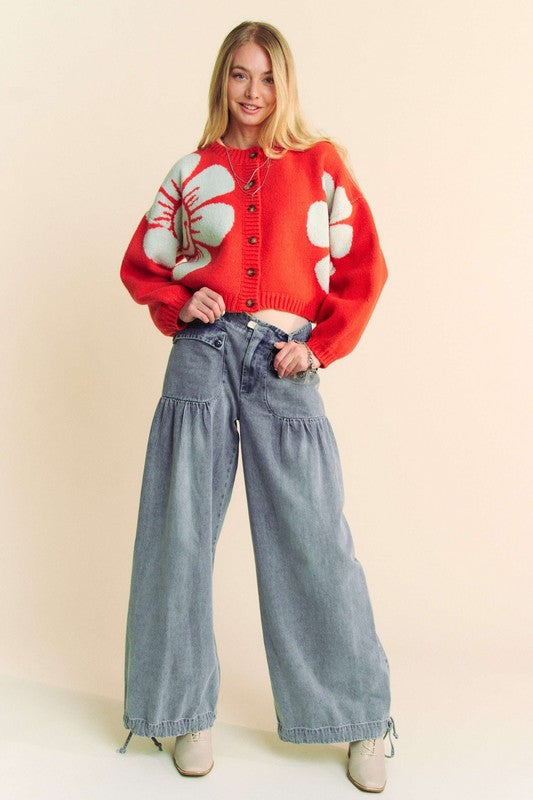 Flower contrast round neck long sleeve cardigan with ribbed and buttoned details.