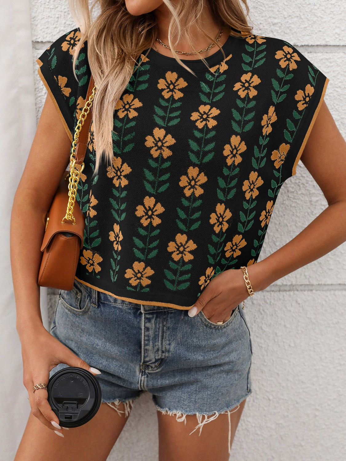 Flower round neck short sleeve knit top.