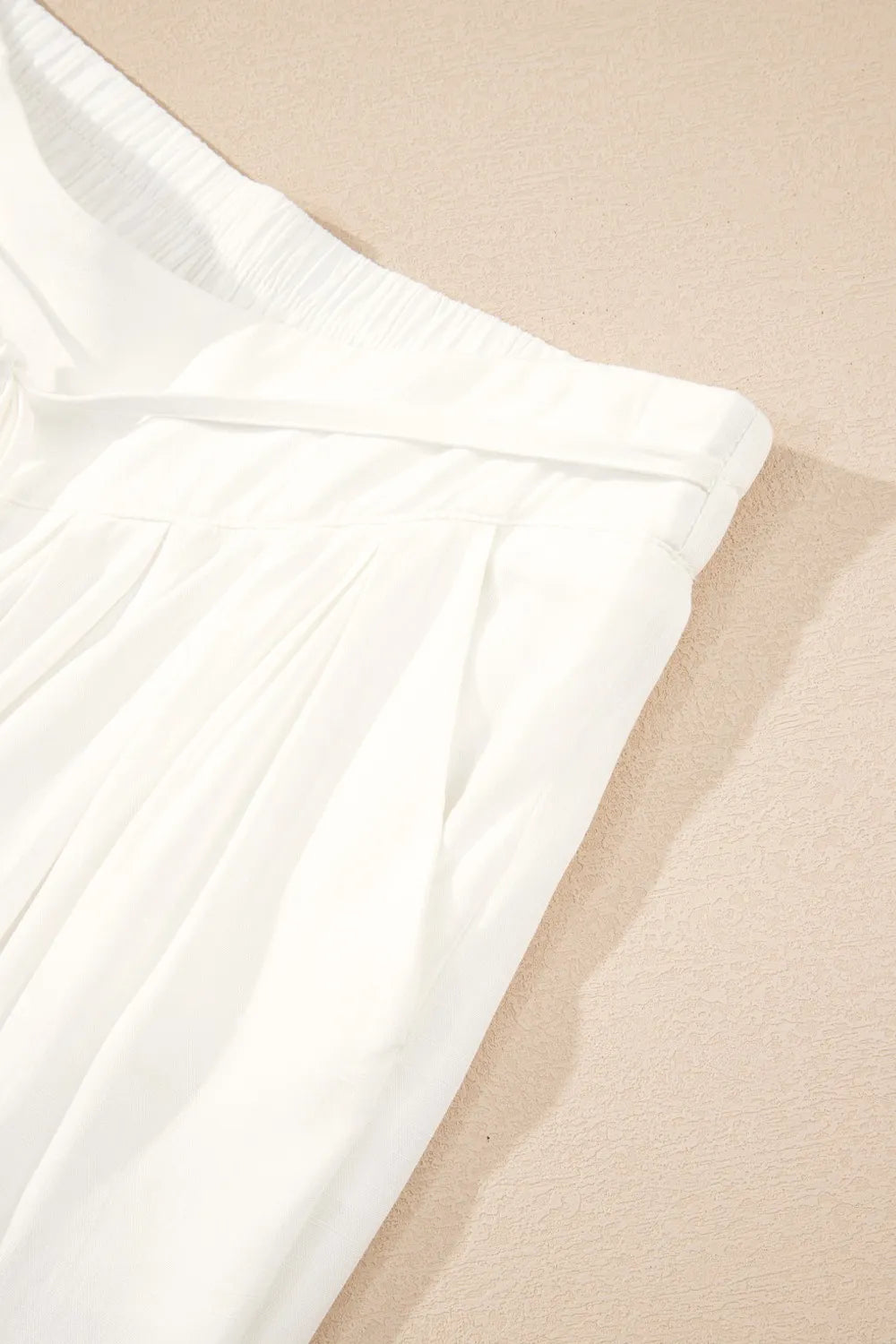 Flowy wide leg pants with drawstring waist.