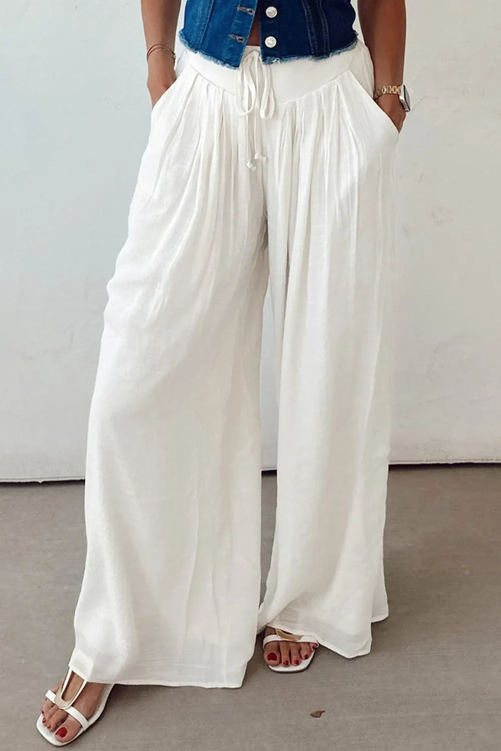 Flowy wide leg pants with drawstring waist.