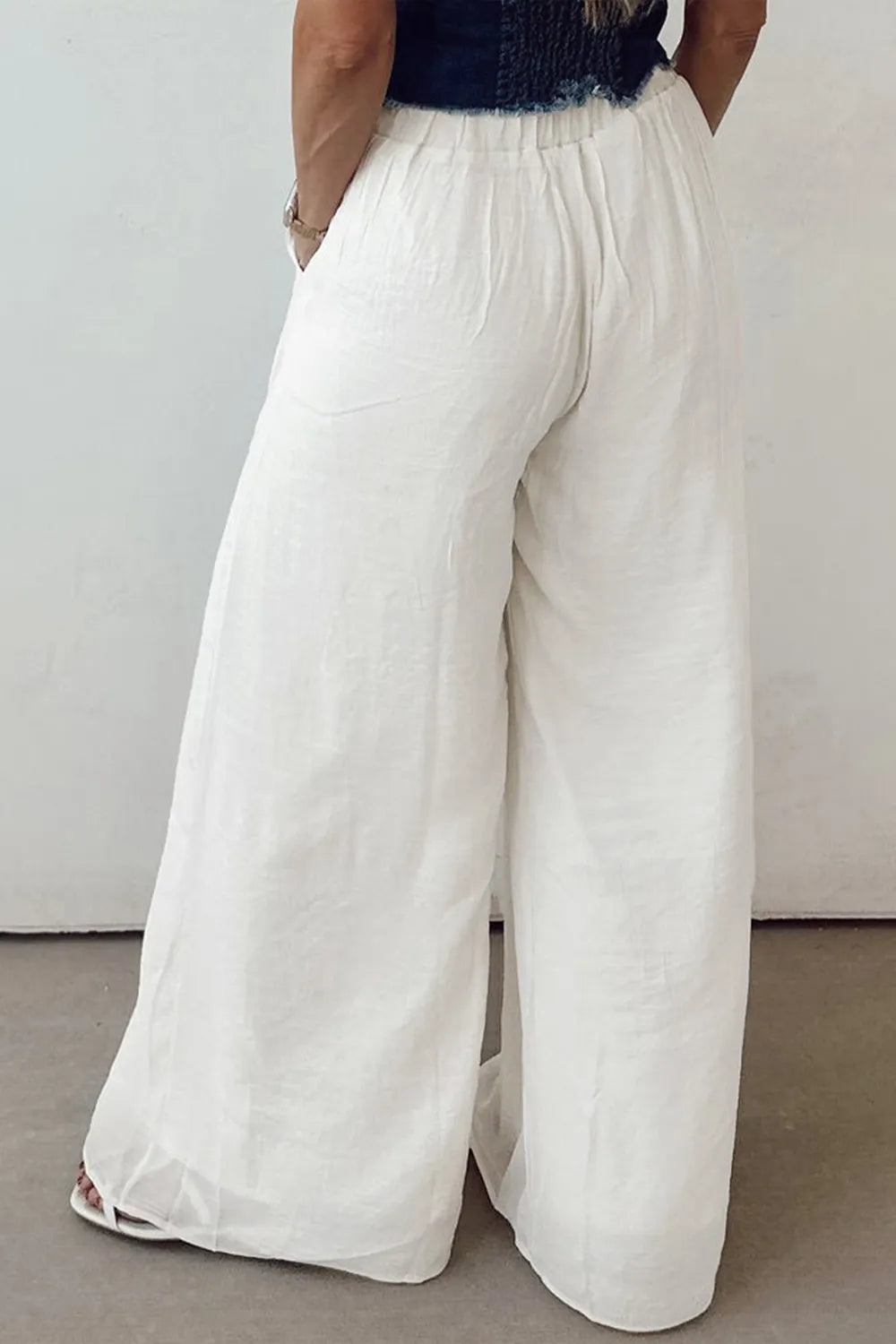 Flowy wide leg pants with drawstring waist.