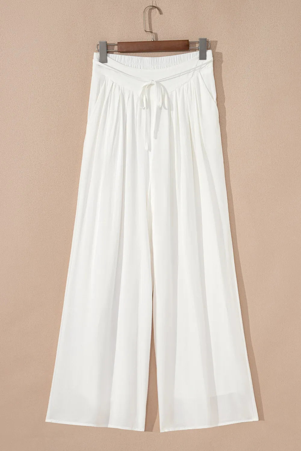 Flowy wide leg pants with drawstring waist.