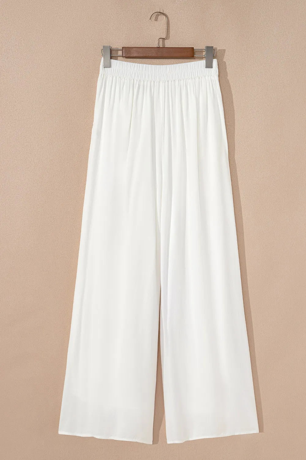 Flowy wide leg pants with drawstring waist.