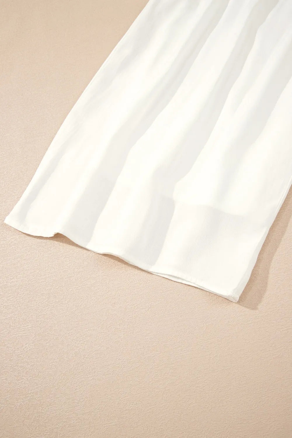 Flowy wide leg pants with drawstring waist.