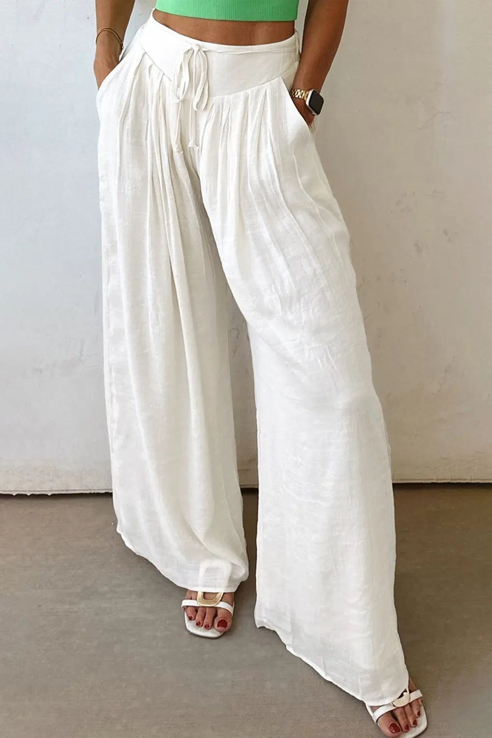 Flowy wide leg pants with drawstring waist.