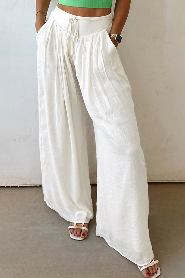 Flowy wide leg pants with drawstring waist.