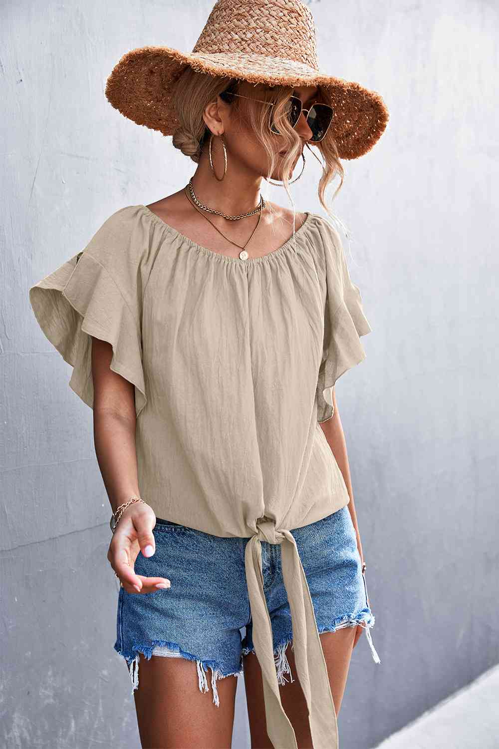 Flutter sleeve tie-front blouse.