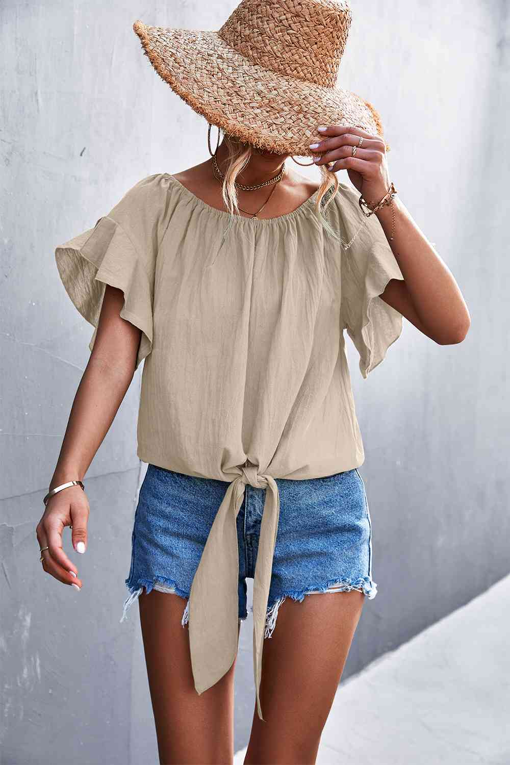 Flutter sleeve tie-front blouse.