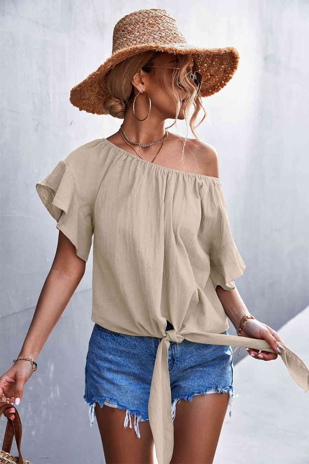 Flutter sleeve tie-front blouse.
