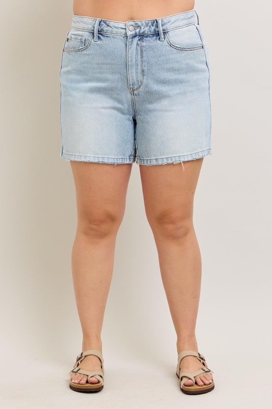 Plus size frayed hem high-rise denim shorts with pockets.