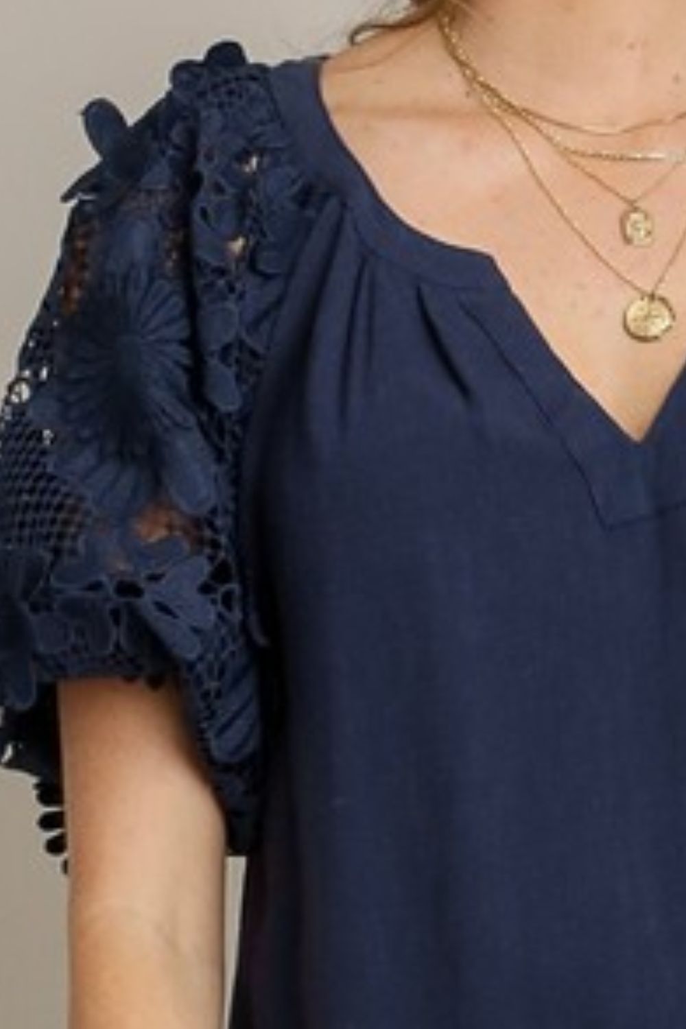 Umgee full size French terry boxy cut top with 3D floral sleeve, plus size.