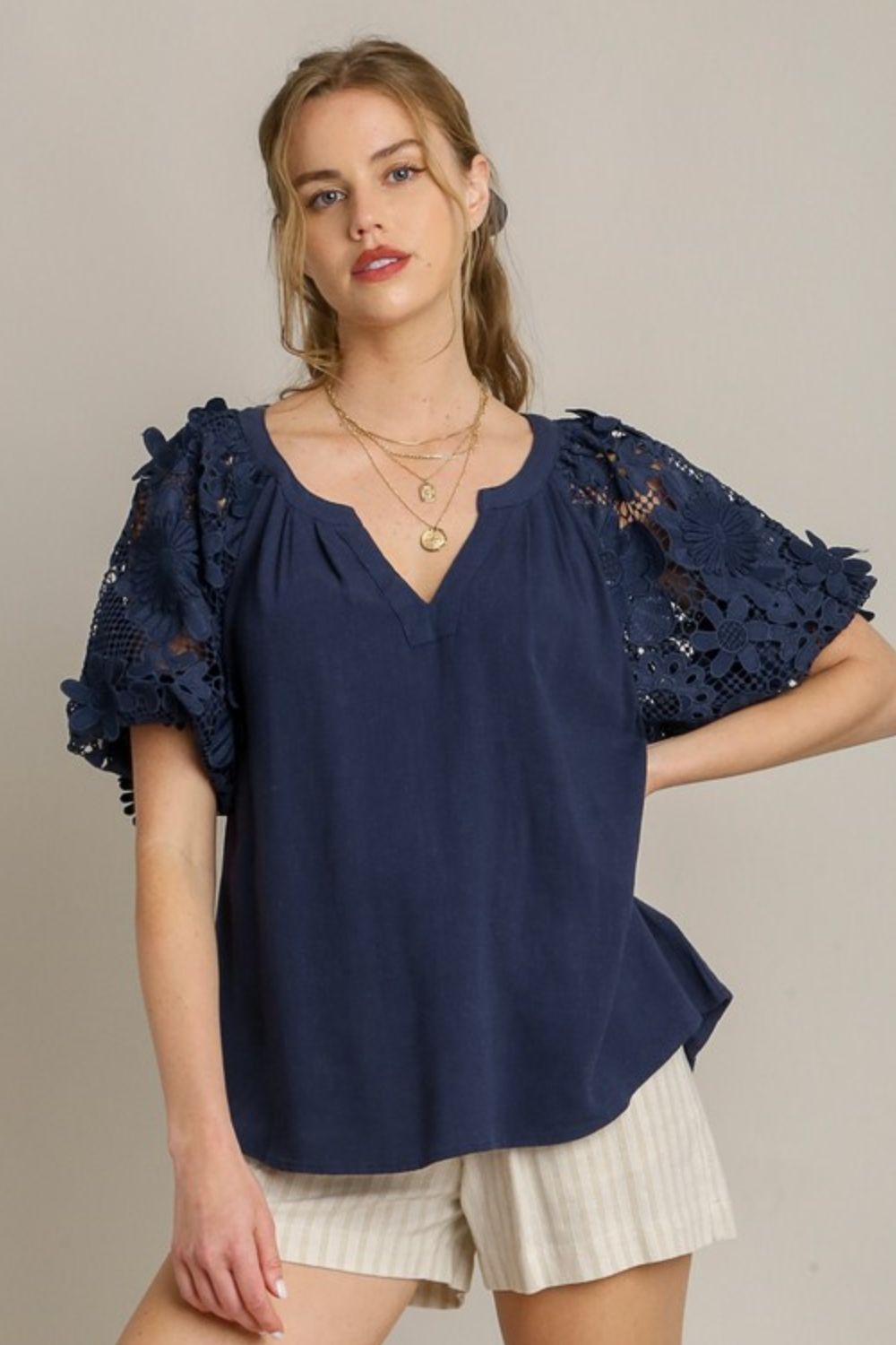 Umgee full size French terry boxy cut top with 3D floral sleeve, plus size.