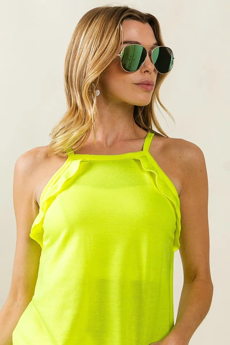 French terry knit ruffled detail sleeveless top.
