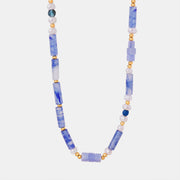 Freshwater pearl and blue chalcedony geometric bead necklace featuring alternating rounded and rectangular beads with gold-plated titanium steel accents.