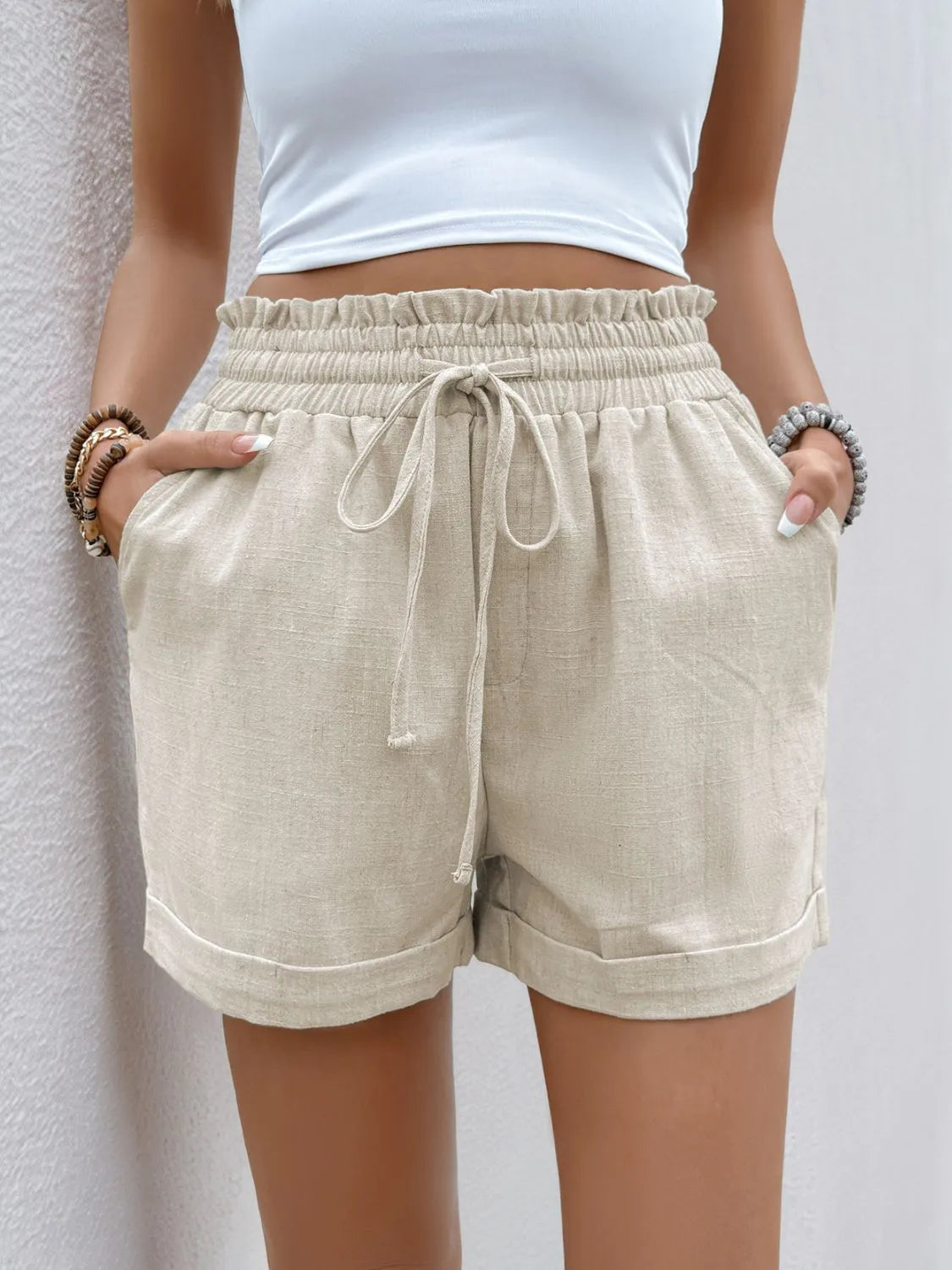 Frill drawstring shorts with pockets.