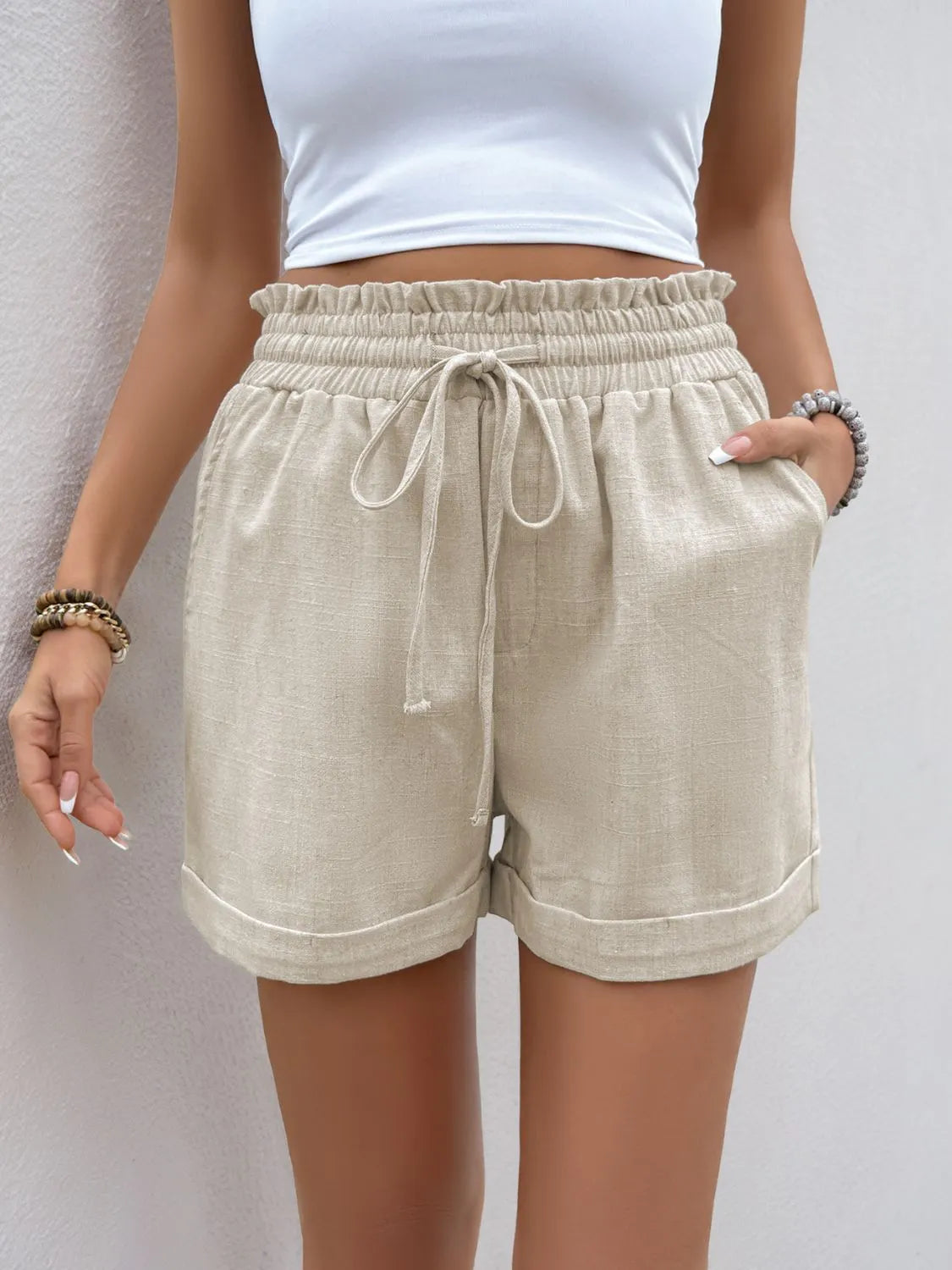 Frill drawstring shorts with pockets.