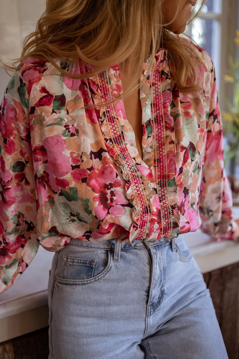 Frill floral button down long sleeve shirt.