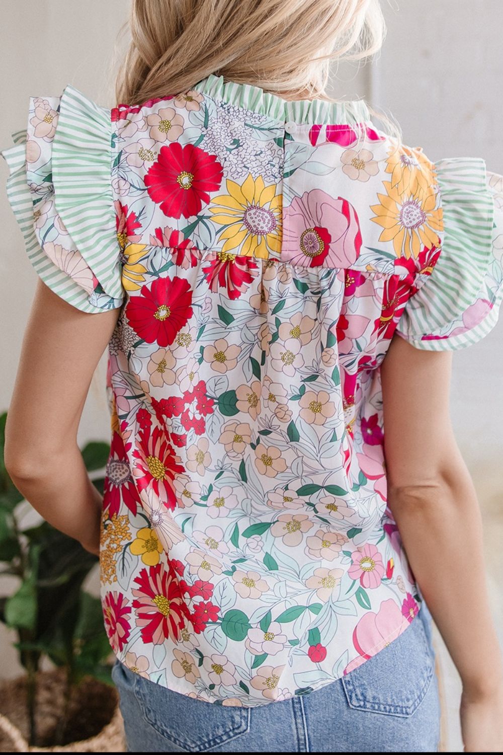 Frill floral print ruffle cap sleeve blouse.