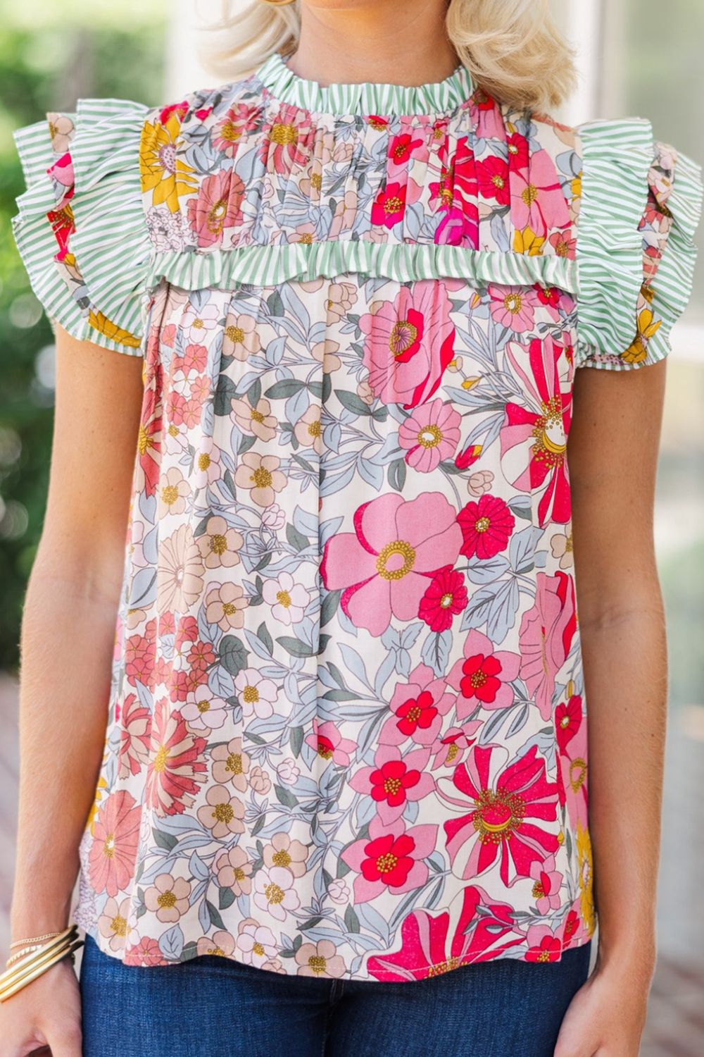 Frill floral print ruffle cap sleeve blouse.