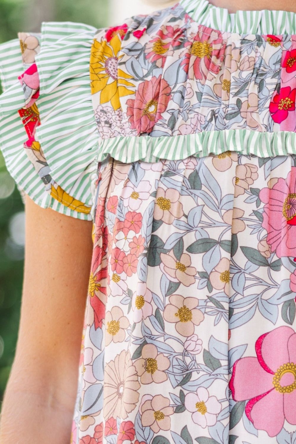 Frill floral print ruffle cap sleeve blouse.