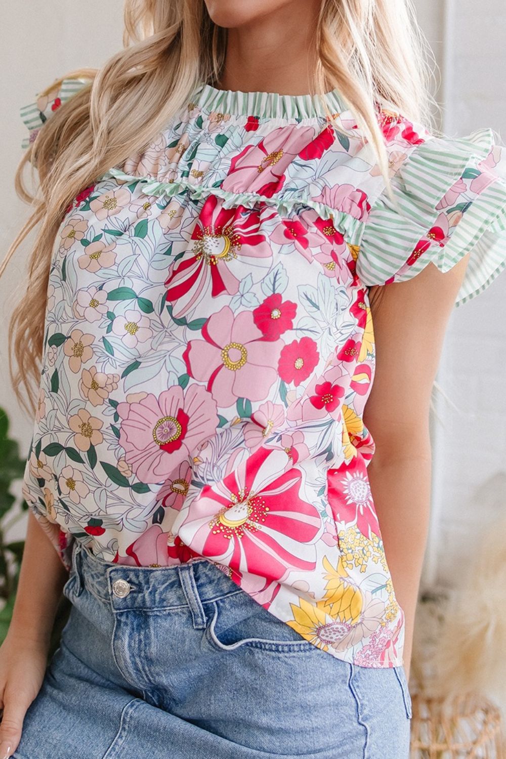 Frill floral print ruffle cap sleeve blouse.