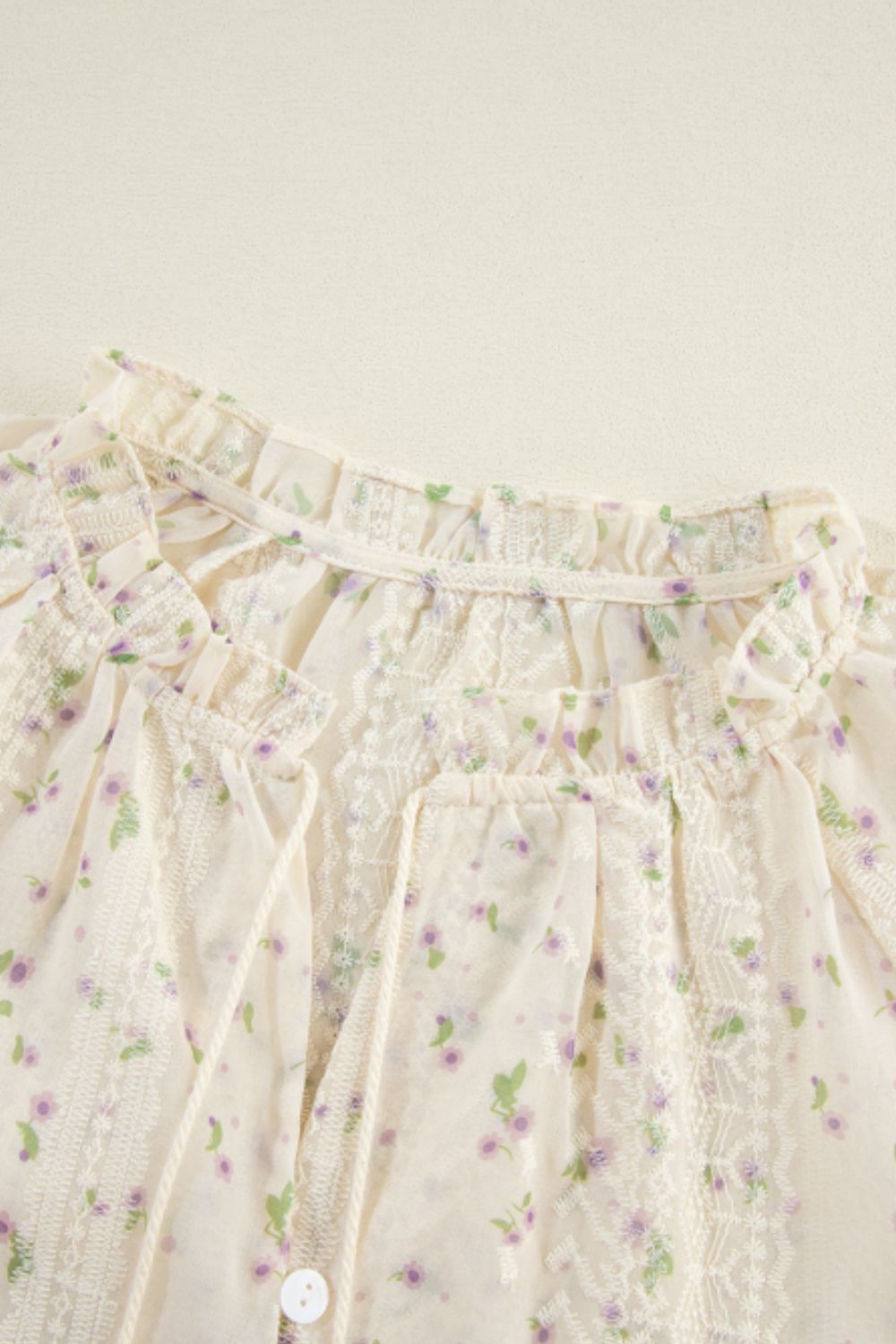Frill lace detail printed tie neck long sleeve blouse.