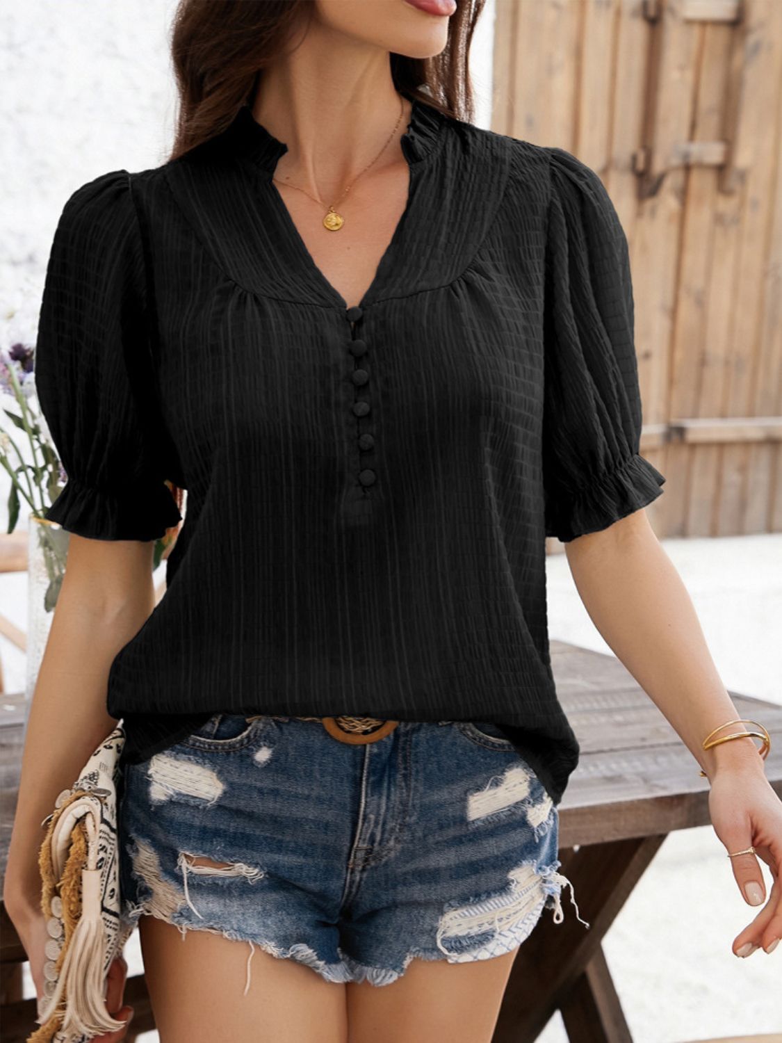Devine frill notched short sleeve blouse.